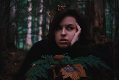 Portrait of woman in forest