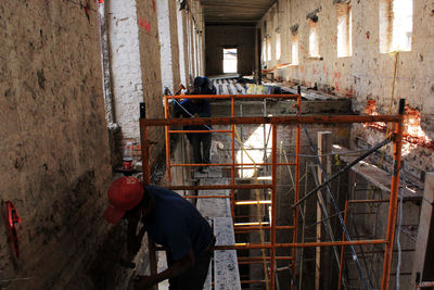 Man working in abandoned building