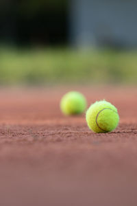 Close-up of tennis ball on field