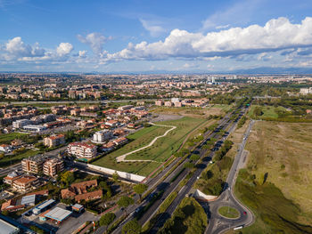 High angle view of buildings in city against sky