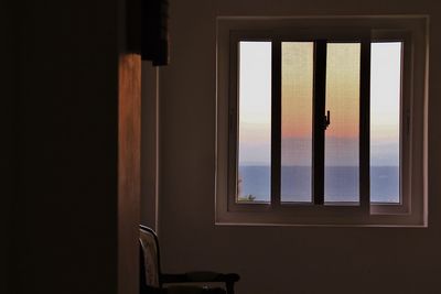 Chair by window at home