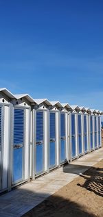 Built structure against blue sky on sunny day