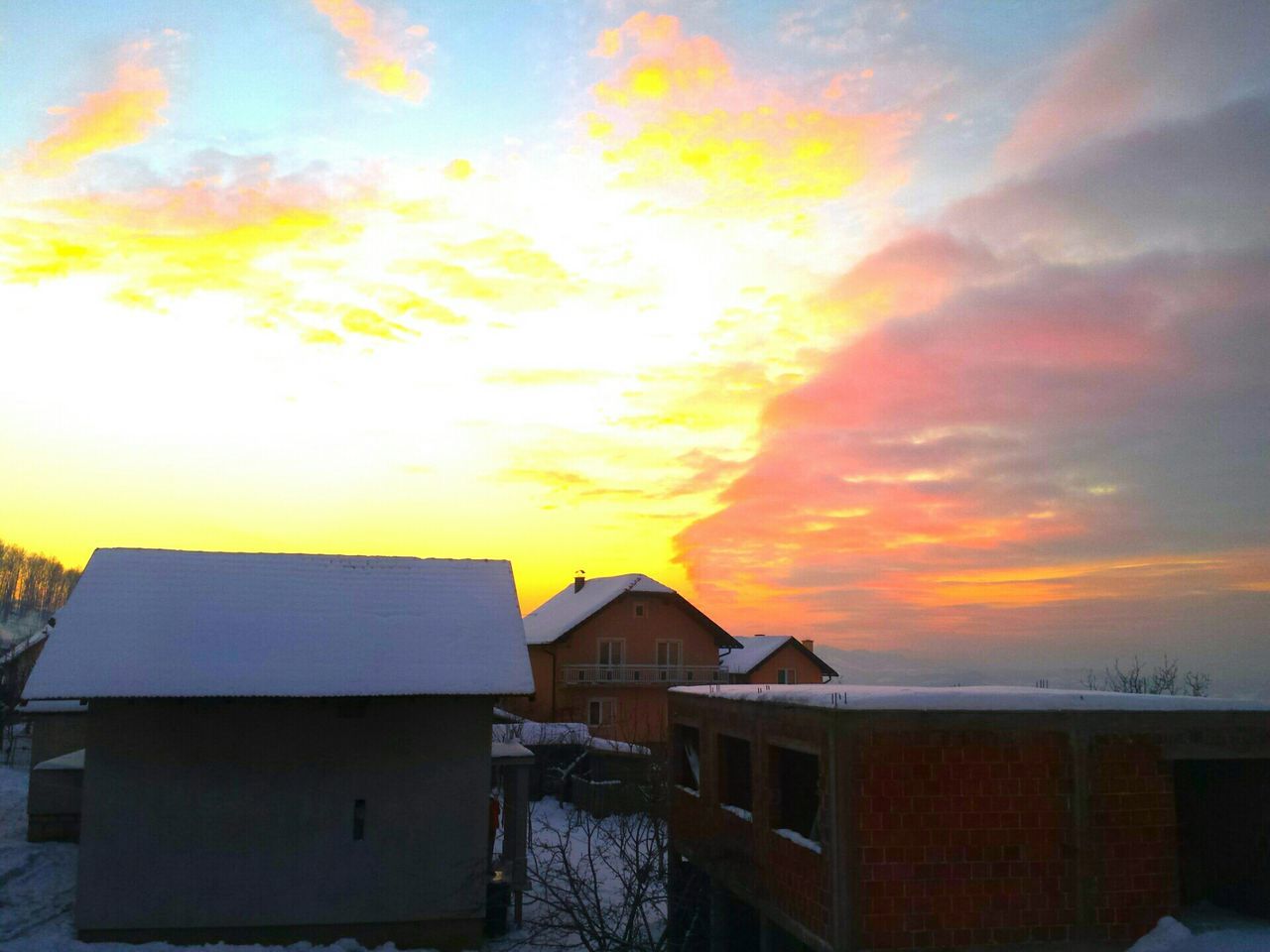 sunset, architecture, built structure, building exterior, orange color, sky, house, cloud - sky, residential structure, roof, residential building, scenics, beauty in nature, cloud, nature, cloudy, outdoors, weather, no people, sea