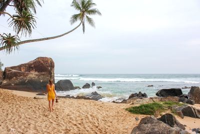 Rear view of man on beach