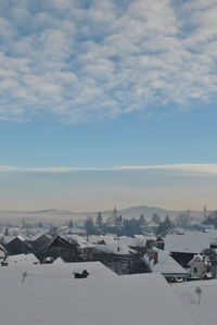 City against sky during winter