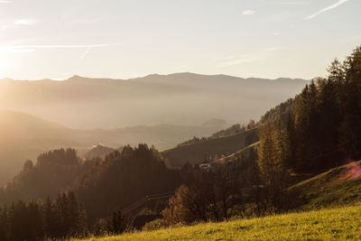 Scenic view of mountains against sky during sunset