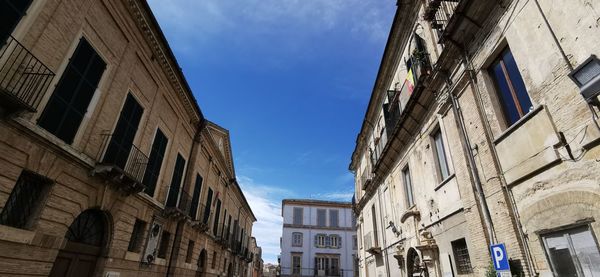 Low angle view of buildings against sky