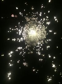 Close-up of illuminated fireworks against sky