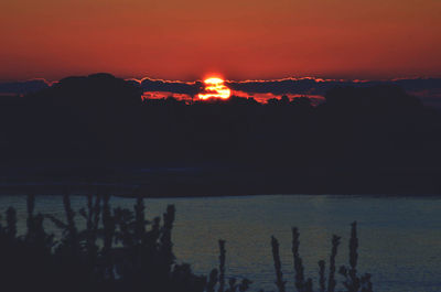 Scenic view of sea against sky at sunset