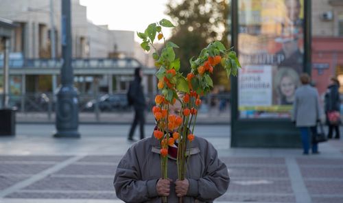 Woman standing in city