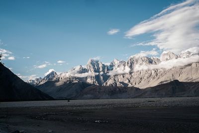 Scenic view of snowcapped mountains against sky