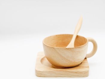 Close-up of cup over white background