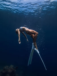 Man swimming in sea