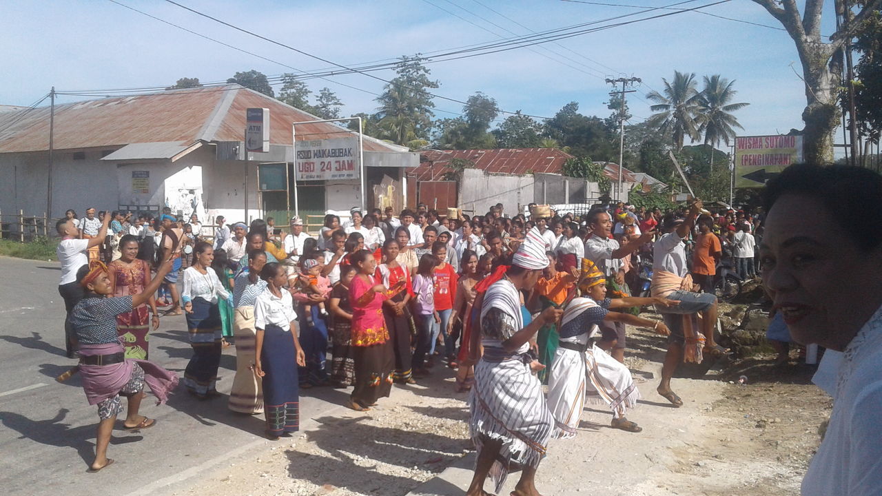 GROUP OF PEOPLE ON STREET