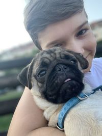 Portrait of woman with dog