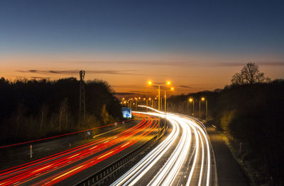 Light trails on road at night