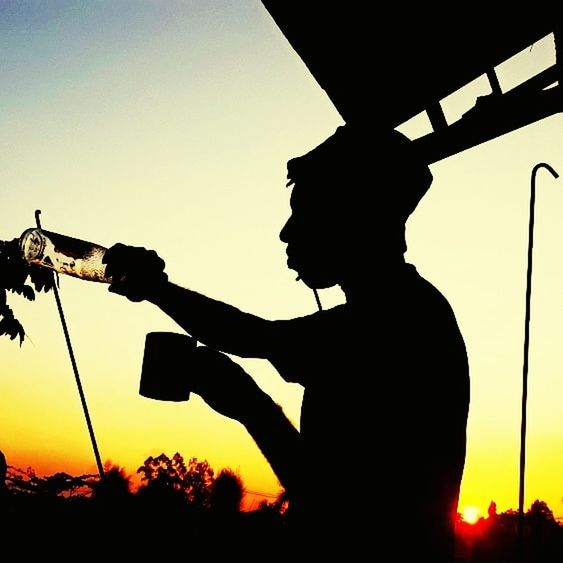 silhouette, sunset, one person, sky, men, music, backlighting, back lit, nature, adult, musical instrument, holding, performance, arts culture and entertainment, orange color