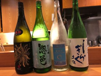 Close-up of various bottles on table