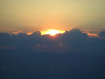 Scenic view of silhouette landscape against sky during sunset