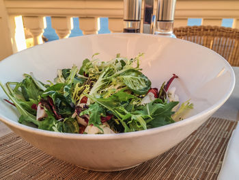 Close-up of salad in bowl on table