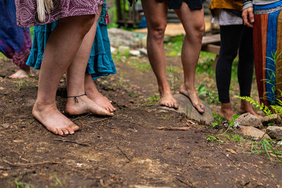 Low section of people standing on ground