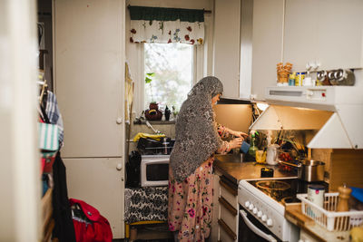 Woman in kitchen