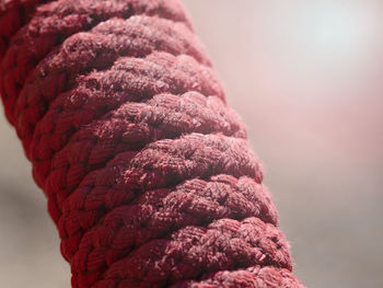 Close-up of red rope against sky