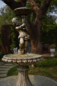 Statue of fountain in park