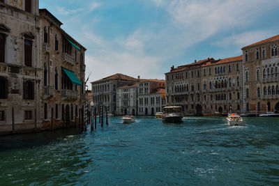 Canal passing through city buildings