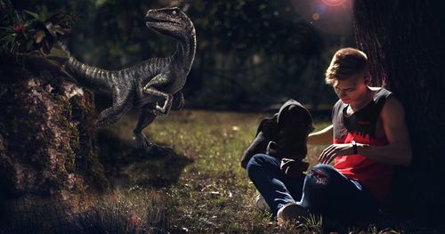 Woman sitting on field