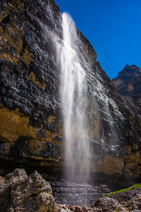 Low angle view of waterfall