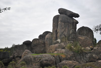 Low angle view of statue against sky