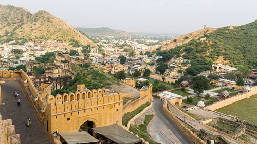 High angle view of buildings in city against sky