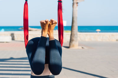 Low section of woman exercising