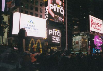 Group of people in city at night