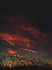 Low angle view of dramatic sky during sunset