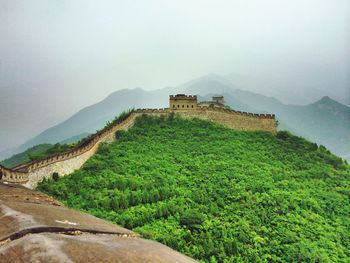 Low angle view of great wall of china against sky