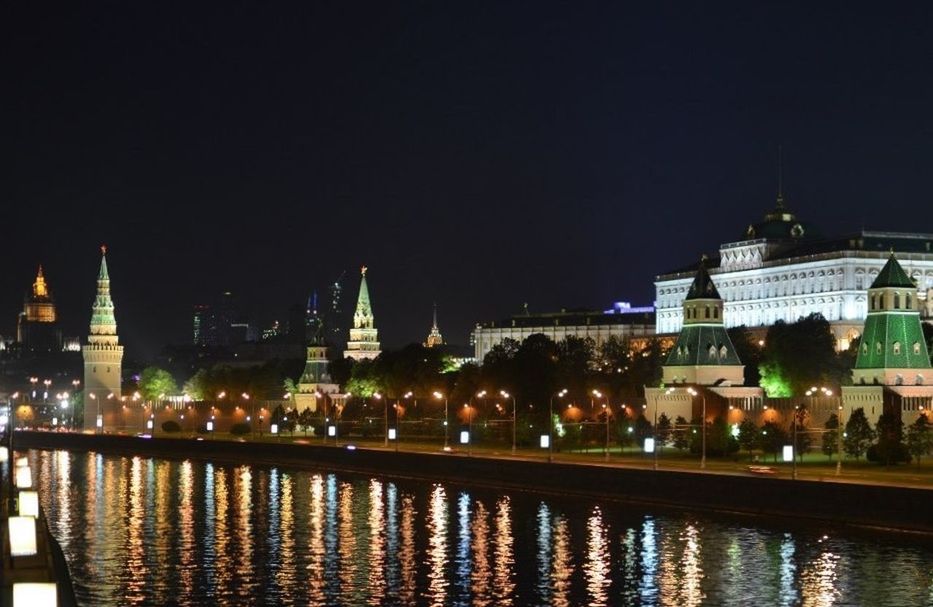 architecture, building exterior, built structure, illuminated, water, night, waterfront, reflection, clear sky, river, copy space, city, outdoors, travel destinations, famous place, no people, lake, religion, sky, place of worship