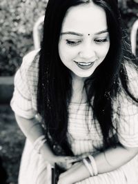 Portrait of smiling young woman