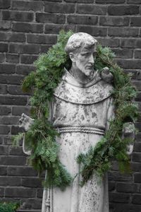 Close-up of statue in cemetery