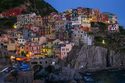 Townscape against sky during sunset