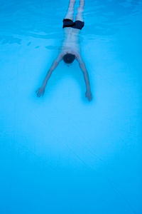 High angle view of man in swimming pool