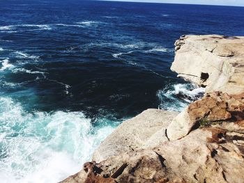 Scenic view of rocks in sea