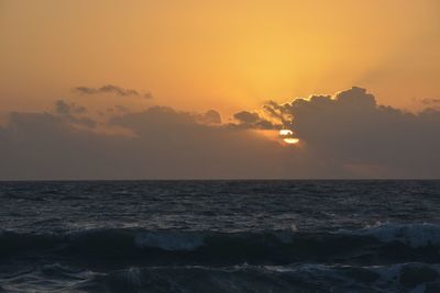 Scenic view of sea against sky during sunset