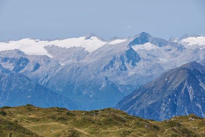 Scenic view of snowcapped mountains against sky