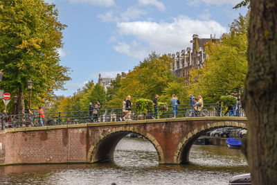 Bridge over river against sky