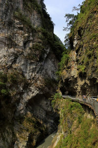 Low angle view of bridge over mountain