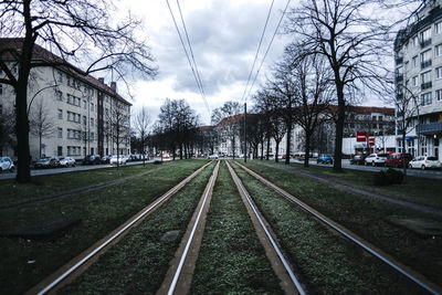 Railroad track passing through city