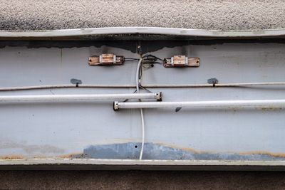 Close-up of fluorescent lights on wall