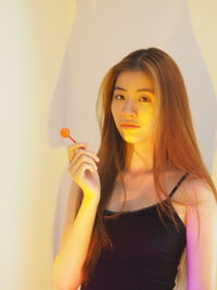 Portrait of beautiful woman at home
